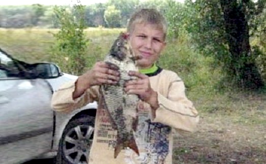 Мой сын поймал первого сазана