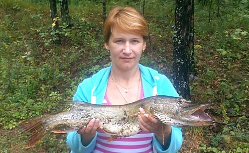 Щука, жена поймала